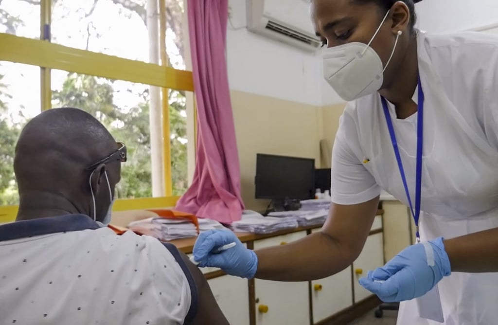 Khamis Juma (left) receives an injection of the coronavirus vaccine manufactured by the Serum Institute of India, from nurse Amelie Richmond at a hospital in Victoria, Mahe Island. Photo: AP Photo Khamis Juma (left) receives an injection of the coronavirus vaccine manufactured by the Serum Institute of India, from nurse Amelie Richmond at a hospital in Victoria, Mahe Island. Photo: AP Photo