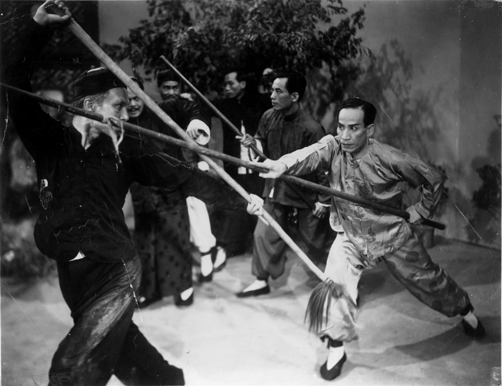 Kwan Tak-hing (right) in the title role in The Story of Wong Fei-hung, Part One: Wong Fei-hung’s Whip that Smacks the Candle (1949). Kwan Tak-hing (right) in the title role in The Story of Wong Fei-hung, Part One: Wong Fei-hung’s Whip that Smacks the Candle (1949).