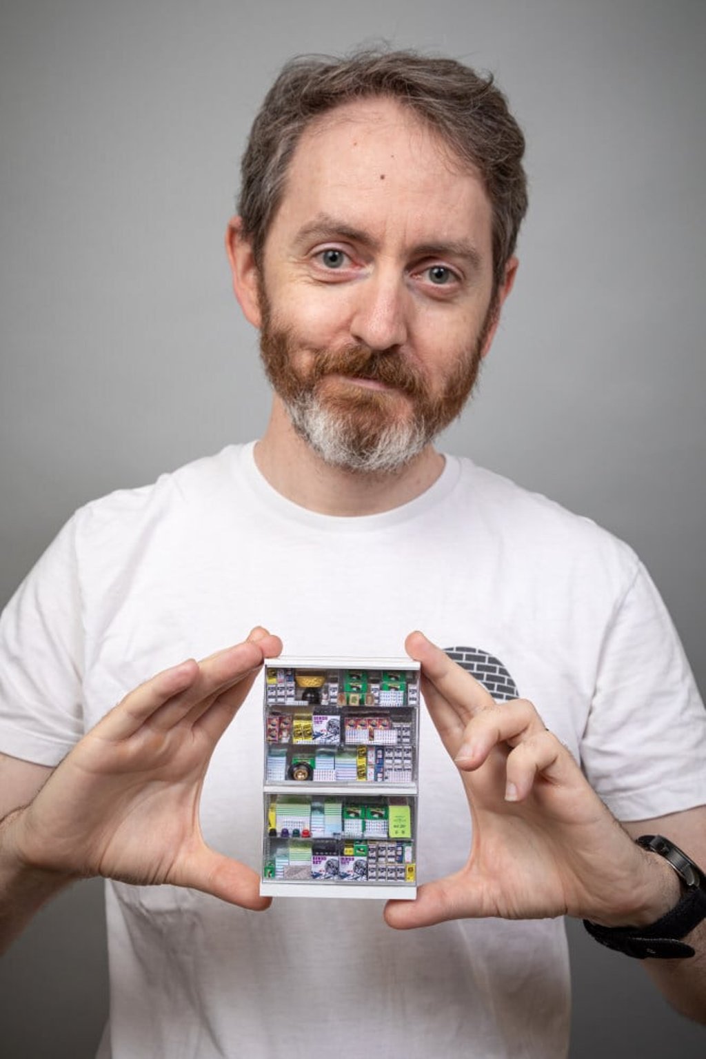 Joshua Smith and a detail from his model of Biu Kee Mahjong. Photo by Andrew Beveridge Joshua Smith and a detail from his model of Biu Kee Mahjong. Photo by Andrew Beveridge