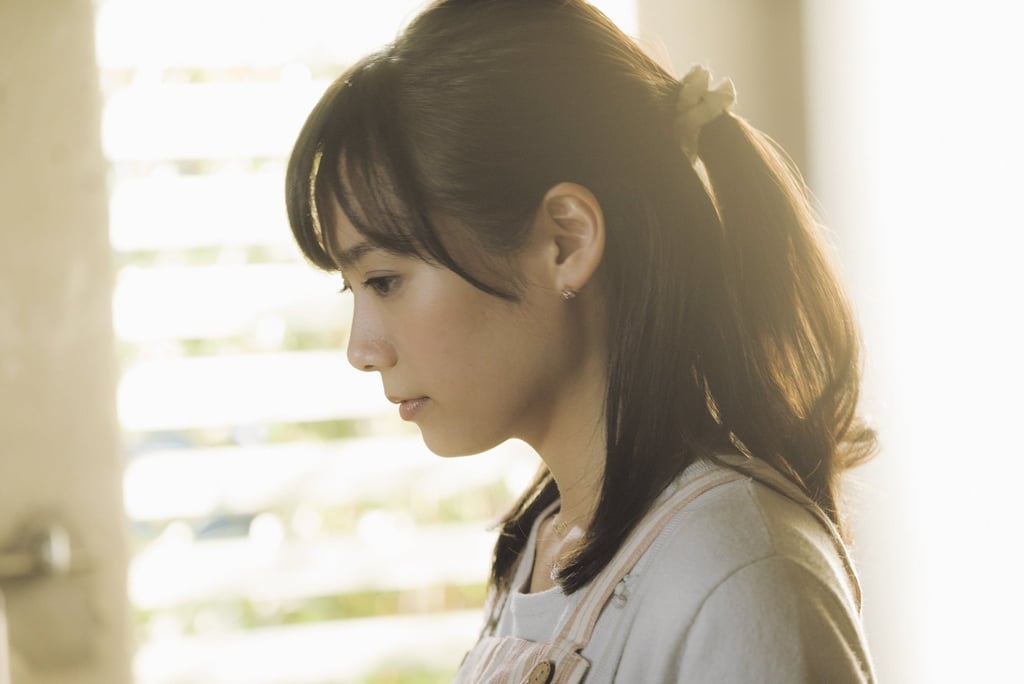 Miyu Sakihi, playing the protagonist’s wife in a small supporting role, in a still from The Cornered Mouse Dreams of Cheese. Miyu Sakihi, playing the protagonist’s wife in a small supporting role, in a still from The Cornered Mouse Dreams of Cheese.
