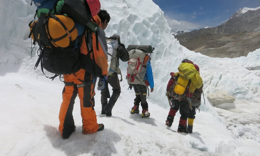 Mountaineers descend from Camp One to Everest base camp via the Khumbu icefall in 2016. Photo: AFP/ Phurba Tenzing