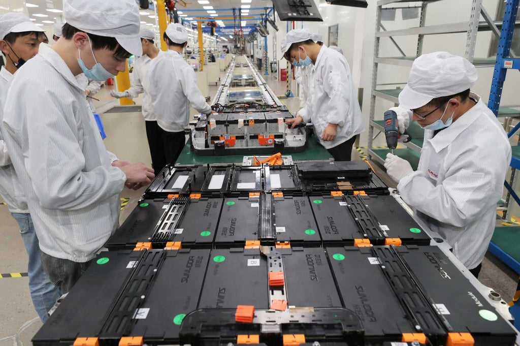 Workers at a factory for Xinwangda Electric Vehicle Battery seen making lithium battery packs for electric cars and other uses, in Nanjing, in China’s eastern Jiangsu province. Photo: AFP