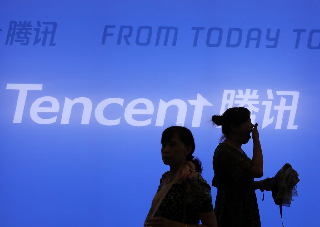 Visitors walk past the exhibition booth of Tencent at the 2018 Smart China Expo. Photo: Simon Song Visitors walk past the exhibition booth of Tencent at the 2018 Smart China Expo. Photo: Simon Song
