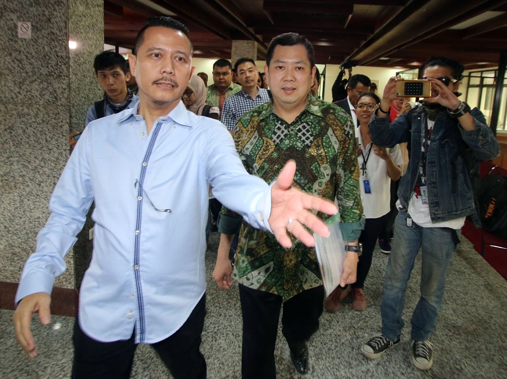Indonesian media and property mogul Hary Tanoesoedibjo (centre). Photo: AFP