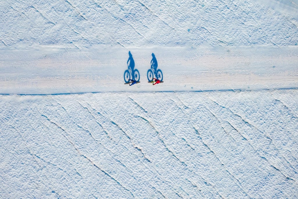 Ice biking in Antarctica. Photo: White Desert Ice biking in Antarctica. Photo: White Desert