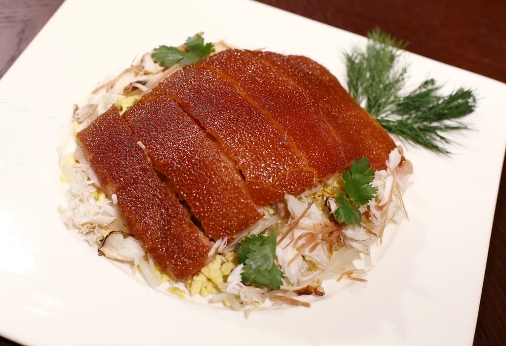 Stir-fried suckling pig with conpoy, bean sprouts and scrambled eggs. Photo: Edmond So