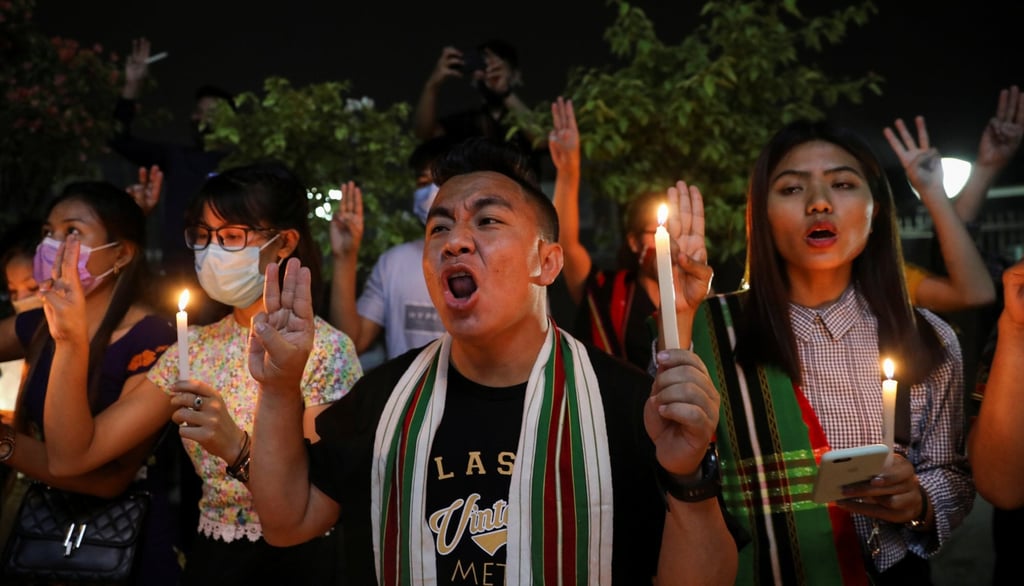 Myanmar citizens in India hold a candlelight vigil to pay tribute to people who died in Myanmar after the military coup. Photo: Reuters