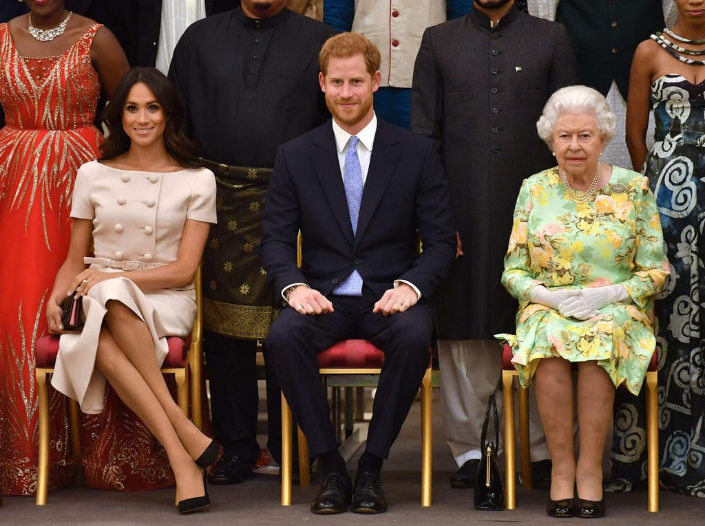 Before the storm: it was all smiles when Meghan, Duchess of Sussex, Britain’s Prince Harry, Duke of Sussex and Britain’s Queen Elizabeth posed for a picture during the queen’s Young Leaders Awards Ceremony in June, 2018. Photo: AFP