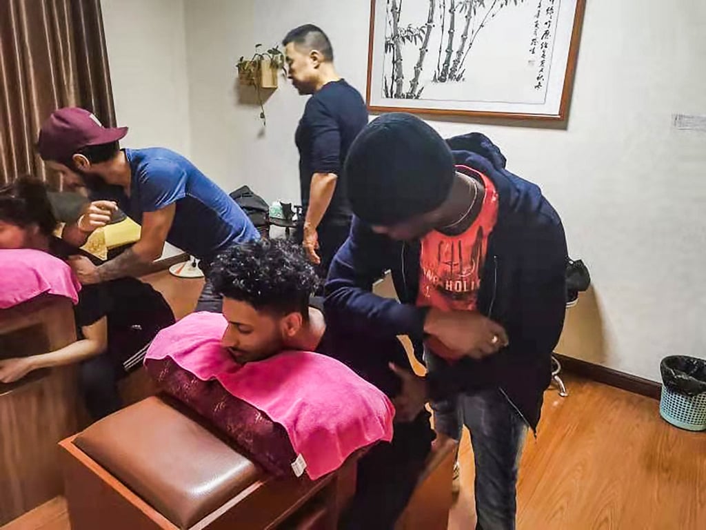 Liang Xuyong during a kung fu massage lesson. Photo: Handout