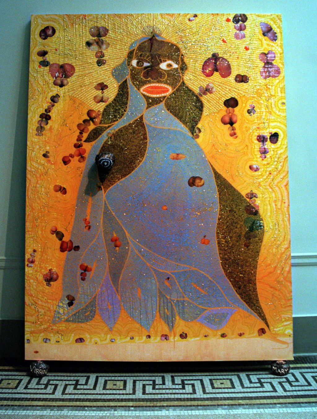 Chris Ofili’s dung-encrusted painting, “The Holy Virgin Mary”, was shown in New York in 1999 and scandalised the city’s then mayor, Rudy Giuliani. Photo: AP Chris Ofili’s dung-encrusted painting, “The Holy Virgin Mary”, was shown in New York in 1999 and scandalised the city’s then mayor, Rudy Giuliani. Photo: AP