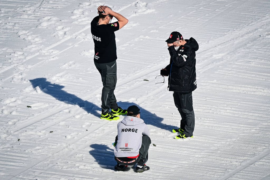 Members of Norway’s ski jumping team react after the crash of Daniel-Andre Tande during in the FIS Ski Jumping World Cup Flying Hill Individual competition. Photo: AFP Members of Norway’s ski jumping team react after the crash of Daniel-Andre Tande during in the FIS Ski Jumping World Cup Flying Hill Individual competition. Photo: AFP