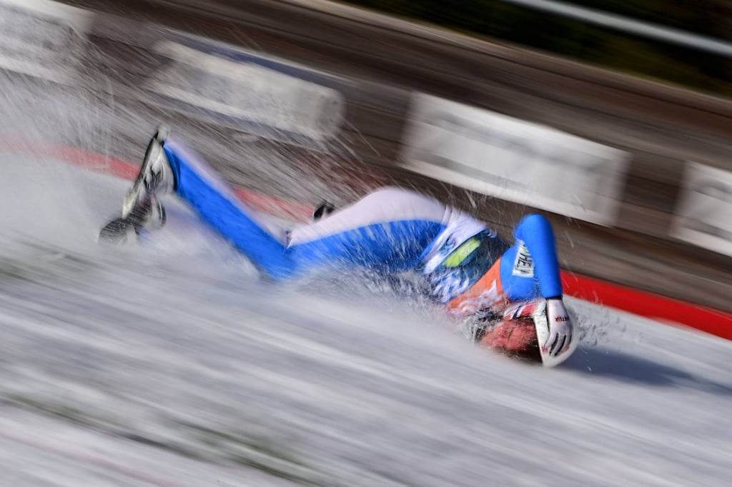 Norways Daniel-Andre Tande slides after a fall during the FIS Ski Jumping World Cup Flying Hill Individual competition in Planica. Photo: AFP Norways Daniel-Andre Tande slides after a fall during the FIS Ski Jumping World Cup Flying Hill Individual competition in Planica. Photo: AFP
