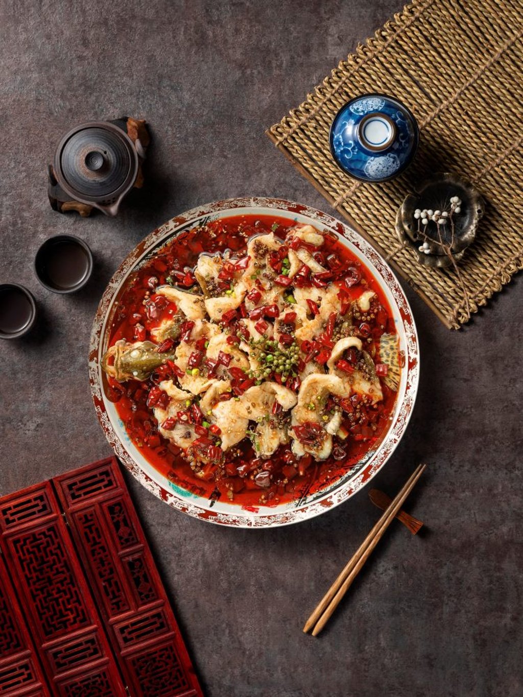 Boiled mandarin fish fillets in chilli oil. Photo: handout Boiled mandarin fish fillets in chilli oil. Photo: handout