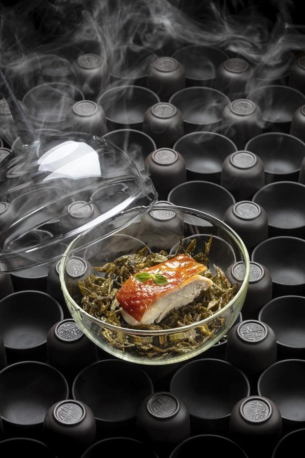 Smoked crispy chicken with longjing tea leaves. Photo: handout