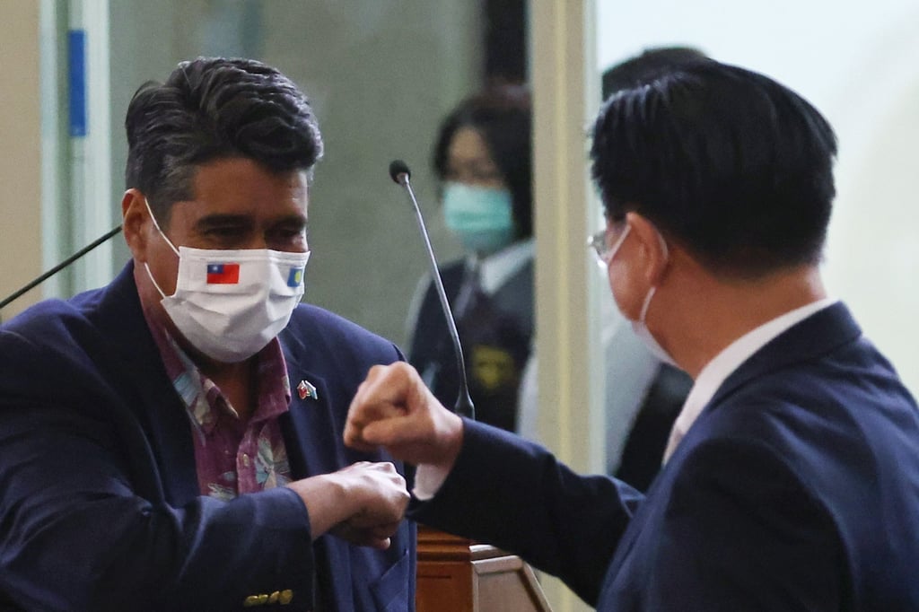 Palau President Surangel Whipps greets Taiwan Foreign Minister Joseph Wu as he arrives at Taoyuan International Airport in Taiwan. Photo: Reuters Palau President Surangel Whipps greets Taiwan Foreign Minister Joseph Wu as he arrives at Taoyuan International Airport in Taiwan. Photo: Reuters