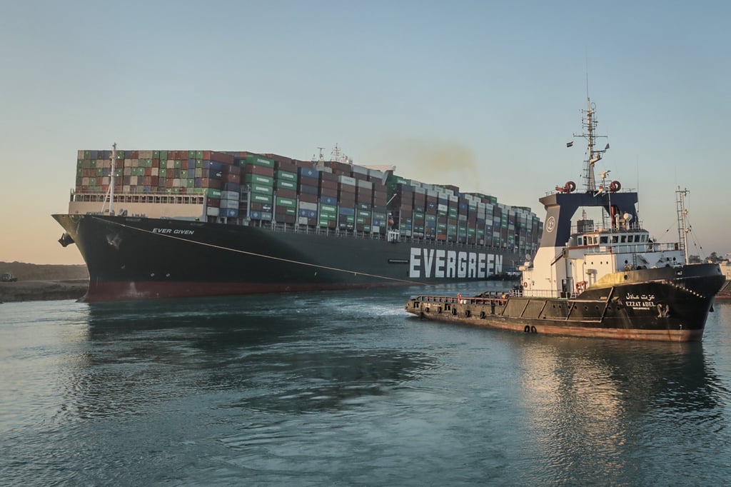 A tugboat drags the Ever Given in the Suez Canal after the ship was successfully freed and re-floated. Photo: Handout/DPA/Zuma Press/TNS A tugboat drags the Ever Given in the Suez Canal after the ship was successfully freed and re-floated. Photo: Handout/DPA/Zuma Press/TNS