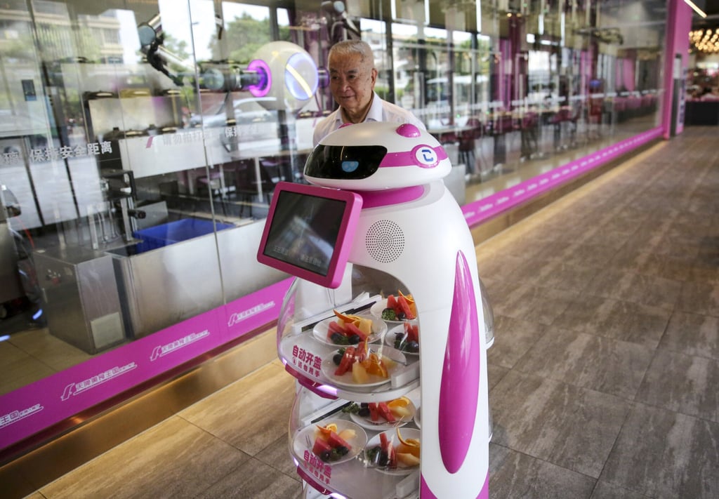 A robot from Qianxi Robotics Group in use at Country Garden’s Foodom Skyfall Food Kingdom Robot Restaurant in Shunde district, Foshan. Photo: Iris Ouyang