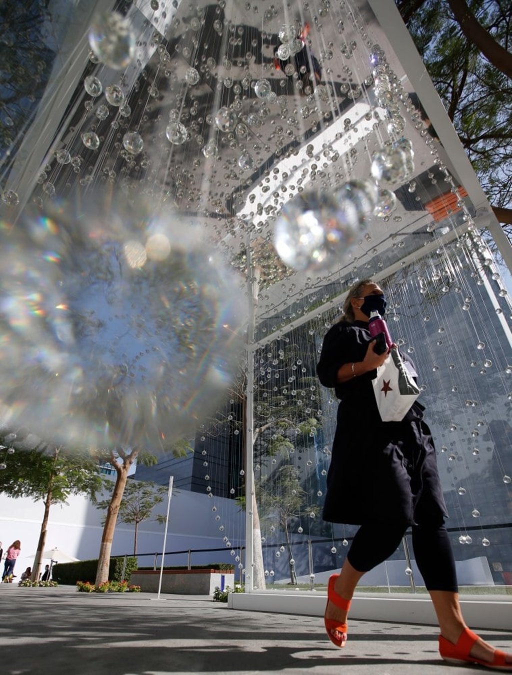 Visitors look at the artwork Swiss Fog Magnified by Bellprat Partner at Art Dubai. Photo: EPA Visitors look at the artwork Swiss Fog Magnified by Bellprat Partner at Art Dubai. Photo: EPA