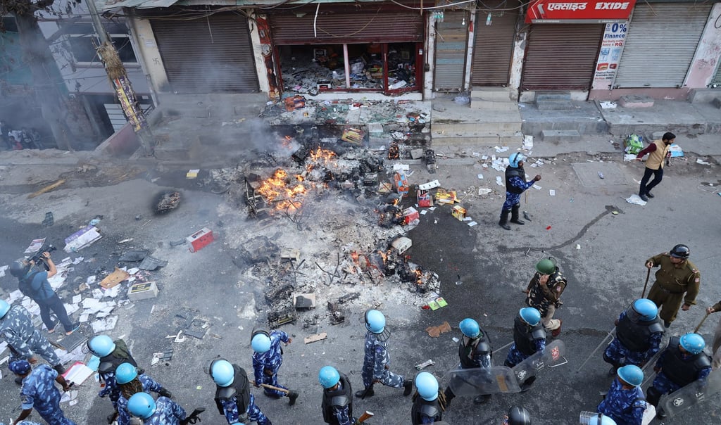 Indian security forces patrol near the site of violent clashes in New Delhi in February 2020. Photo: EPA