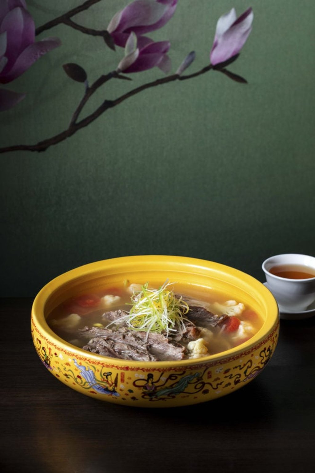 Braised lamb brisket with sour and spicy broth from Dong Lai Shun.