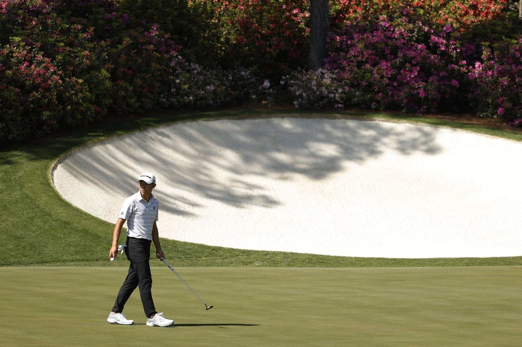 Collin Morikawa putts at the 13th green during a practice round at the Masters at Augusta National Golf Club in Georgia. Photo: AFP