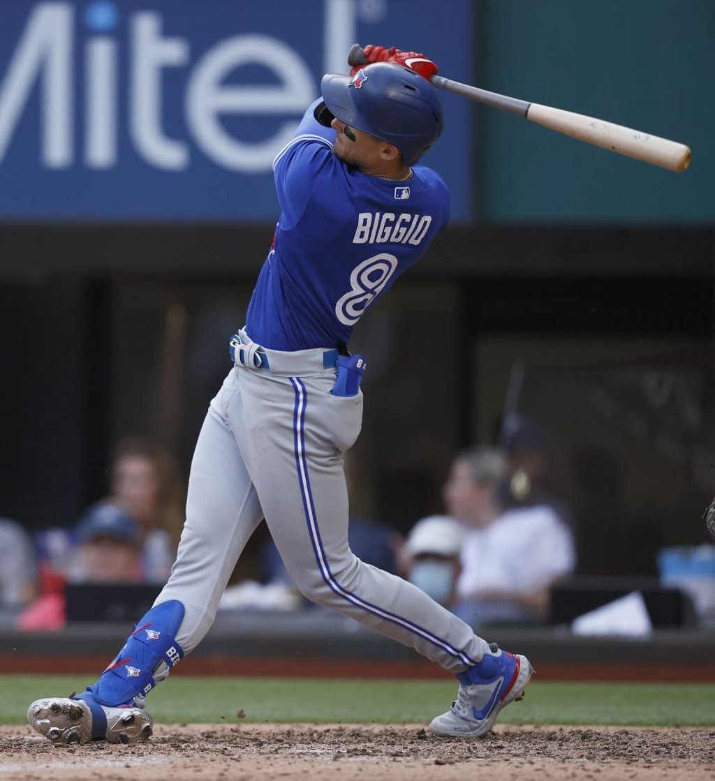 Toronto Blue Jays hitter Cavan Biggio connects in the top of the seventh inning on opening day at Globe Life Field in Arlington, Texas. Photo: AFP