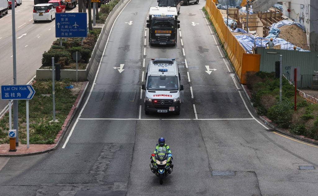 A convoy of police vehicles brings activist Andy Li to West Kowloon Court on Wednesday. Photo: K.Y. Cheng A convoy of police vehicles brings activist Andy Li to West Kowloon Court on Wednesday. Photo: K.Y. Cheng