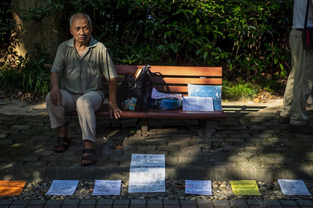 Relatives of single people advertise their profiles in the Shanghai Marriage Market in 2020. Photo: EPA-EFE Relatives of single people advertise their profiles in the Shanghai Marriage Market in 2020. Photo: EPA-EFE