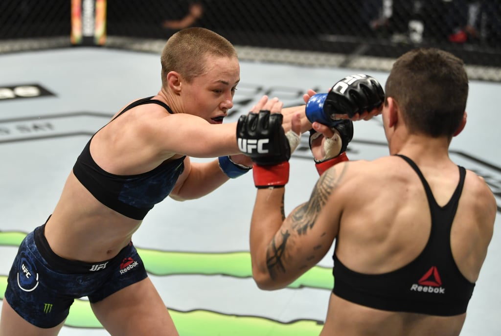 Rose Namajunas punches Jessica Andrade in their strawweight fight at UFC 251. Photo: Jeff Bottari/Zuffa LLC