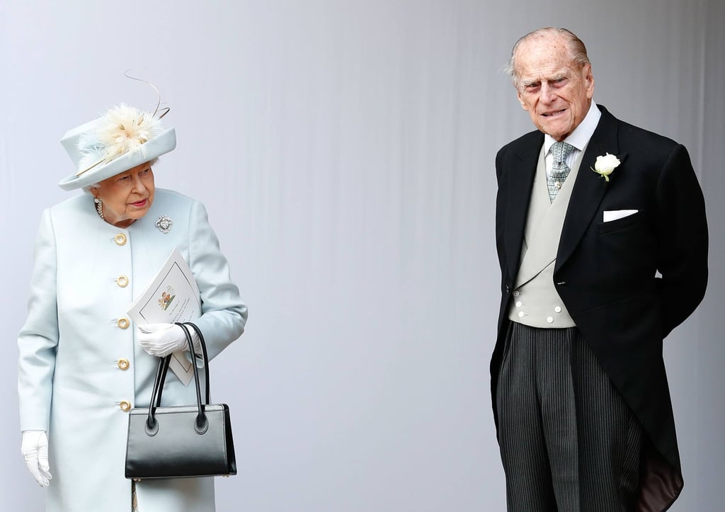 Britain’s Queen Elizabeth and Prince Philip, Duke of Edinburgh, wait for the carriage carrying Princess Eugenie of York and her husband Jack Brooksbank after their wedding ceremony at St George’s Chapel, Windsor Castle, in Windsor, in October 2018. Photo: AFP
