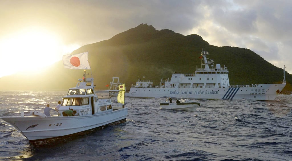 A Chinese maritime surveillance vessel is pictured passing near the Diaoyu Islands, which Japan controls and calls the Senkakus, in 2013. Photo: Kyodo A Chinese maritime surveillance vessel is pictured passing near the Diaoyu Islands, which Japan controls and calls the Senkakus, in 2013. Photo: Kyodo