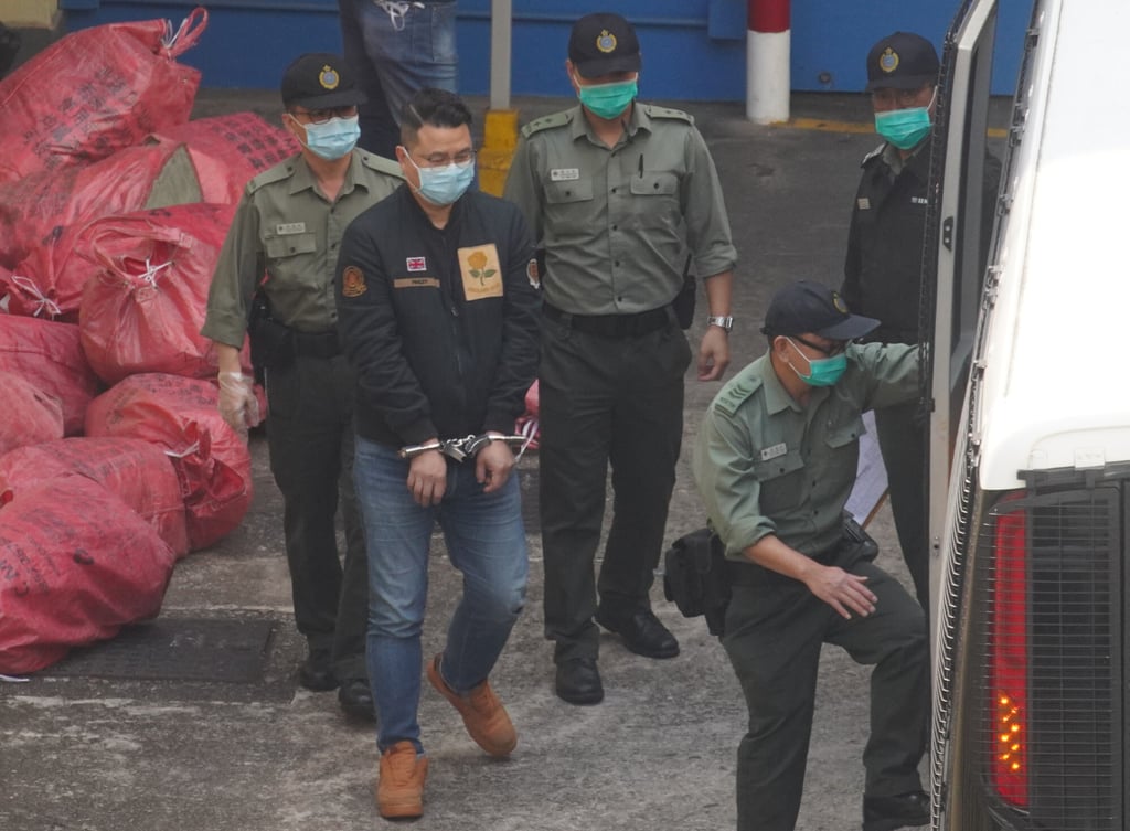 Former lawmaker Andrew Wan is escorted to a court hearing earlier this month. Photo: Winson Wong Former lawmaker Andrew Wan is escorted to a court hearing earlier this month. Photo: Winson Wong