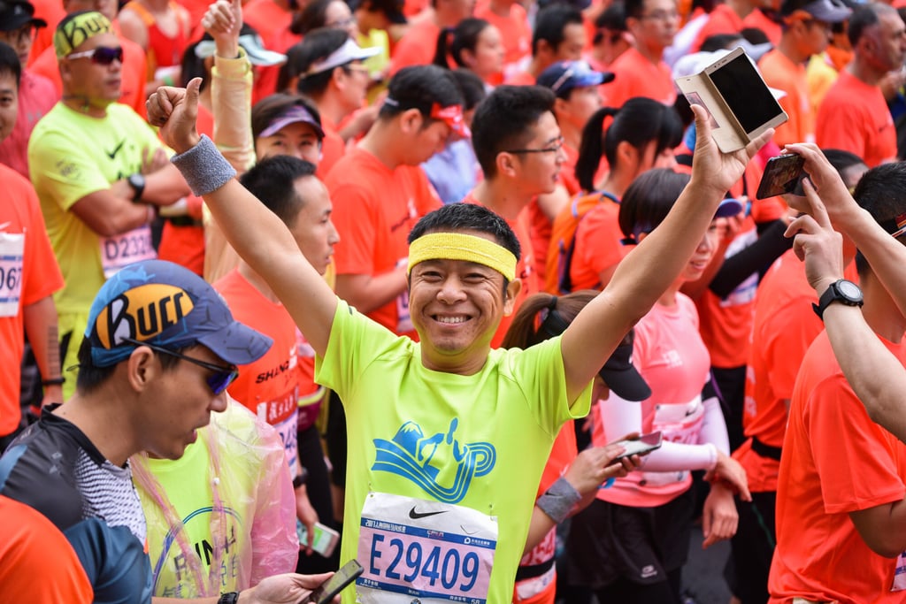 A runner prepares with thousands of fellow competitors at the start of the 2018 Shanghai Marathon. Photo: Handout