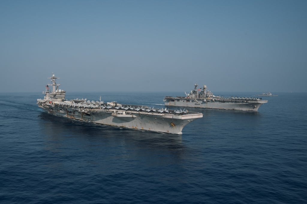 The Theodore Roosevelt Carrier Strike Group transits in formation with the Makin Island Amphibious Ready Group in the South China Sea on April 9, 2021. Photo: Handout The Theodore Roosevelt Carrier Strike Group transits in formation with the Makin Island Amphibious Ready Group in the South China Sea on April 9, 2021. Photo: Handout