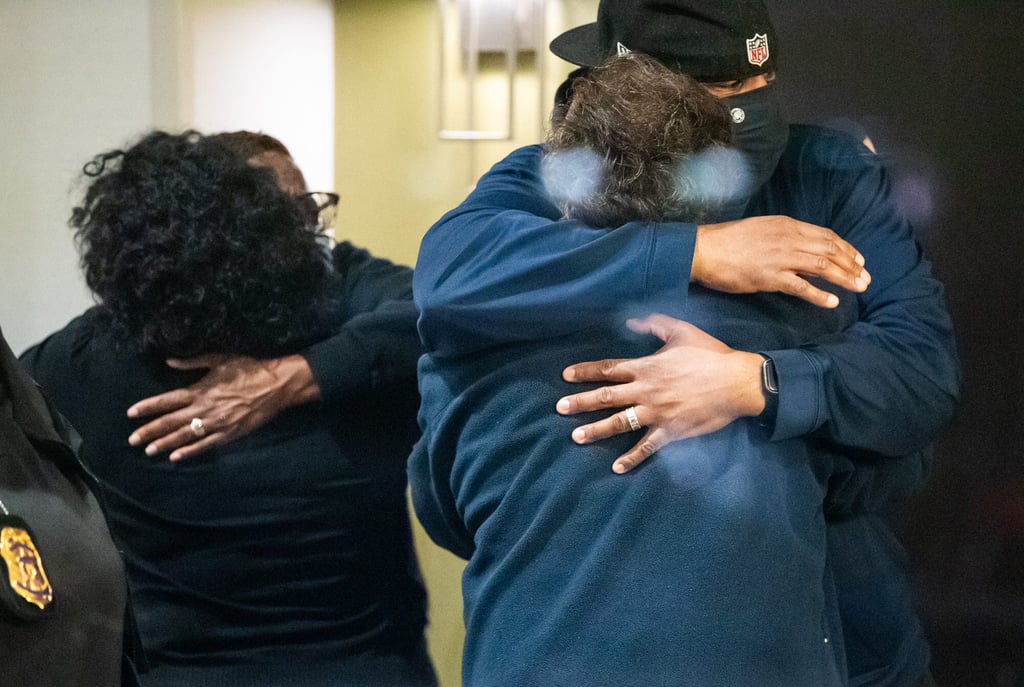 People hug after learning that their loved ones are safe after a gunman shot and killed eight people inside a FedEx building late Thursday night. Photo: DPA People hug after learning that their loved ones are safe after a gunman shot and killed eight people inside a FedEx building late Thursday night. Photo: DPA