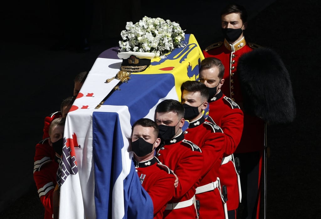 The coffin of Britain’s Prince Philip is laid onto a modified Land Rover Defender before the ceremonial funeral procession to St George’s Chapel in Windsor Castle on Saturday. Photo: AFP The coffin of Britain’s Prince Philip is laid onto a modified Land Rover Defender before the ceremonial funeral procession to St George’s Chapel in Windsor Castle on Saturday. Photo: AFP