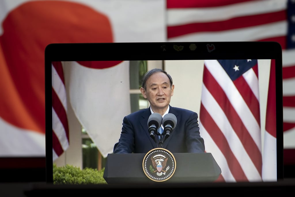Japanese Prime Minister Yoshihide Suga seen on a TV screen delivering a speech at the White House. Photo: Xinhua