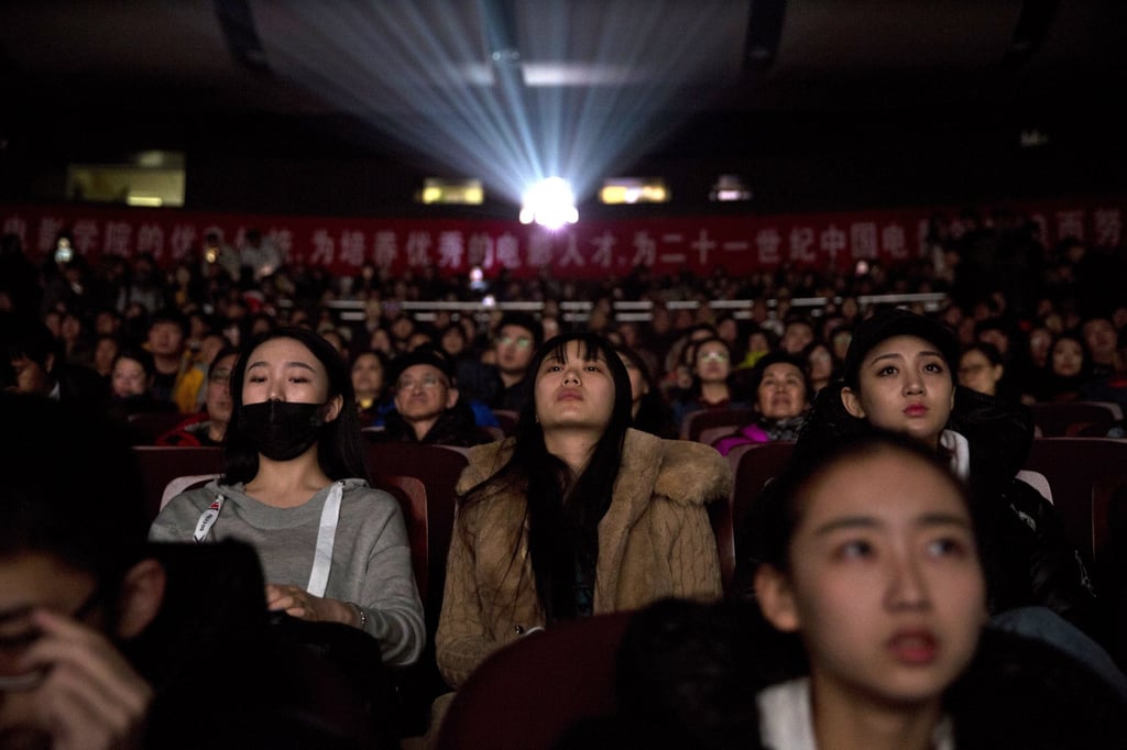 In this March 22, 2018 photo, audience members watch a screening of the propaganda documentary “Amazing China” at the Beijing Film Academy in Beijing, China. Photo: AP In this March 22, 2018 photo, audience members watch a screening of the propaganda documentary “Amazing China” at the Beijing Film Academy in Beijing, China. Photo: AP