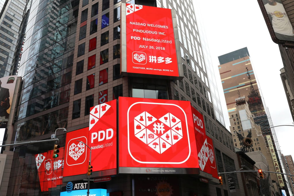 A display in Times Square in New York shows a message after Pinduoduo was listed on the Nasdaq exchange in July 2018. Photo: Reuters