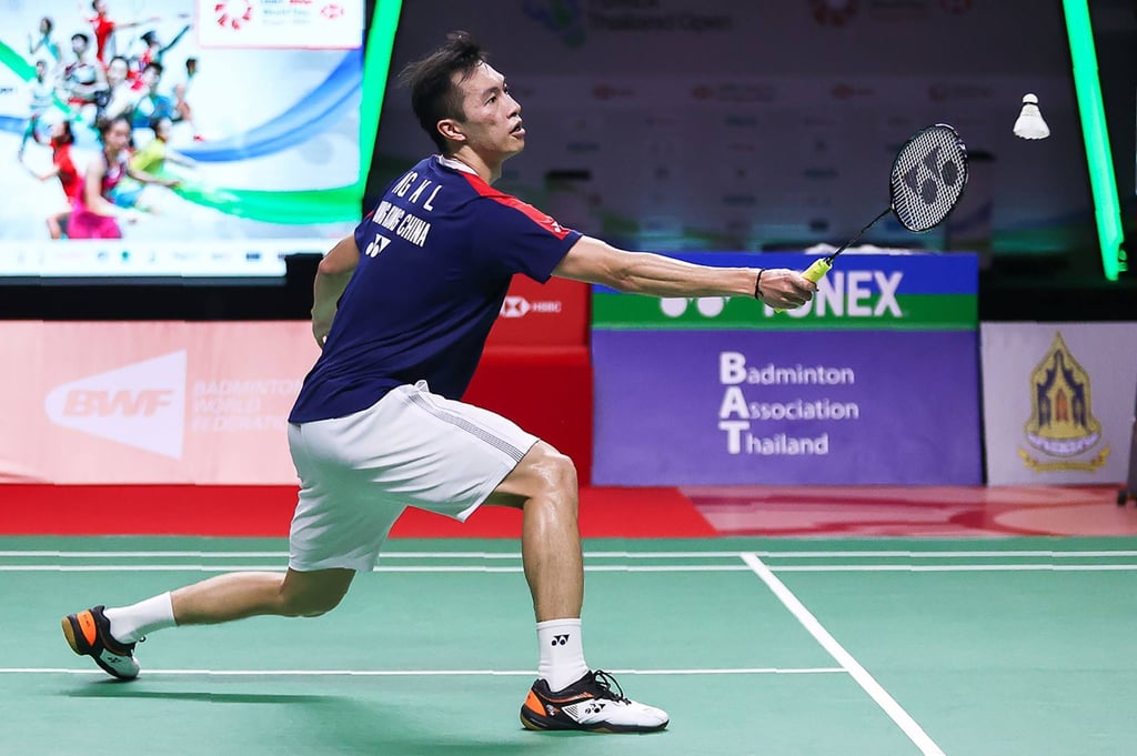 Angus Ng hits a return against Denmark’s Viktor Axelsen during the men’s singles final at the Thailand Open in Bangkok. Photo: BAT /AFP