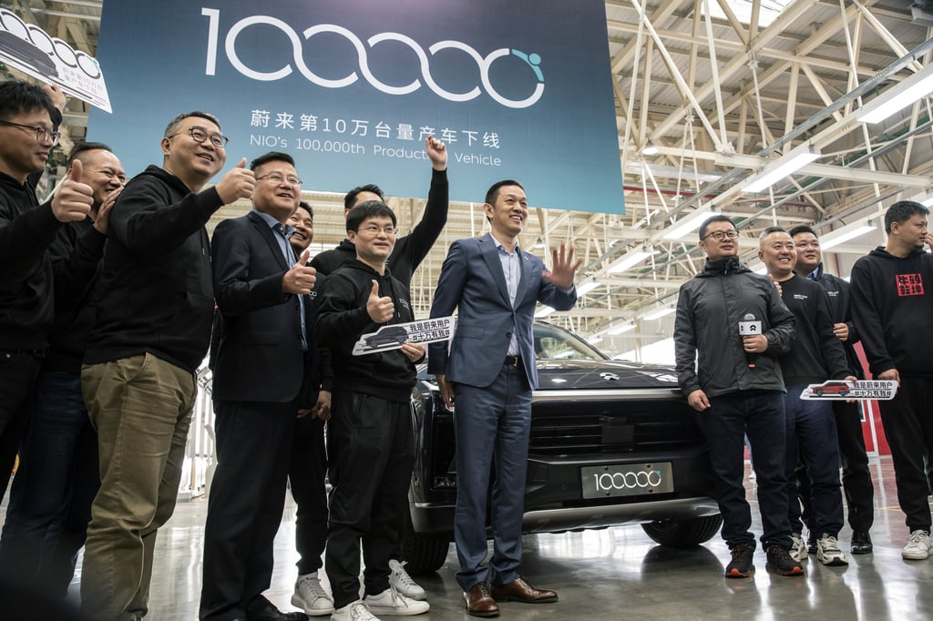 William Li, CEO of Nio, centre, at an event marking the roll-out of the company’s 100,000th electric vehicle at the automaker’s factory in Hefei, Anhui province, China, on April 7. Photo: Bloomberg William Li, CEO of Nio, centre, at an event marking the roll-out of the company’s 100,000th electric vehicle at the automaker’s factory in Hefei, Anhui province, China, on April 7. Photo: Bloomberg