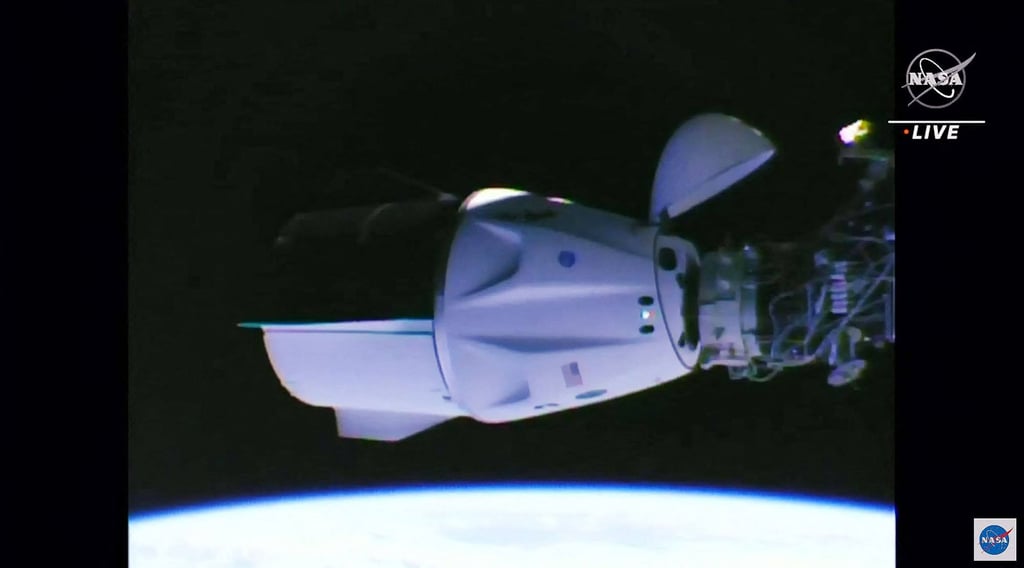 The SpaceX’s Crew Dragon spacecraft docked at the International Space Station, on Saturday. Photo: AFP / Nasa