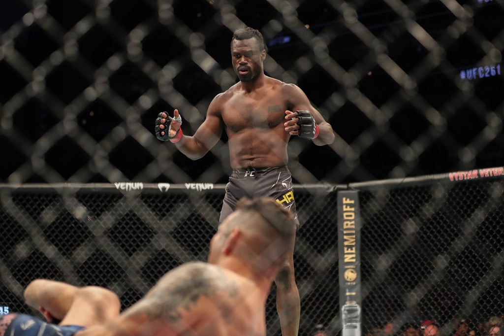 Uriah Hall reacts after Chris Weidman suffers a broken leg at UFC 261. Photo: AFP