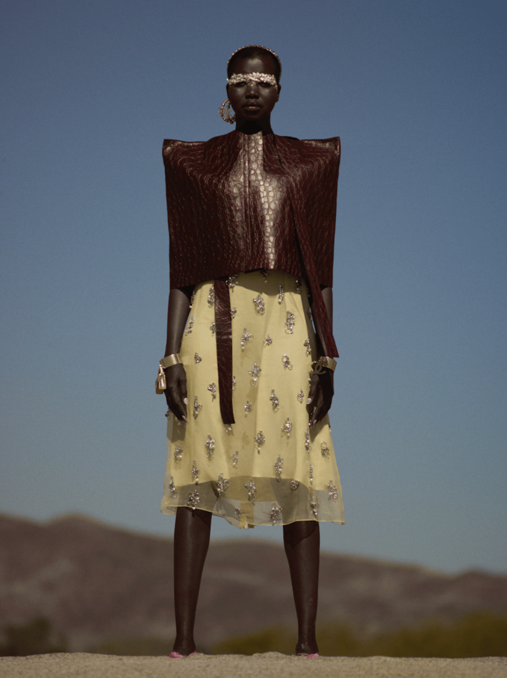 Givenchy cape, HK$25,500, dress, HK$39,500; Chanel headband, HK$6,200, earrings, HK$7,100, cuff (right hand), HK$20,600, cuff (left hand), HK$13,400; Versace heels, price upon request. Givenchy cape, HK$25,500, dress, HK$39,500; Chanel headband, HK$6,200, earrings, HK$7,100, cuff (right hand), HK$20,600, cuff (left hand), HK$13,400; Versace heels, price upon request.