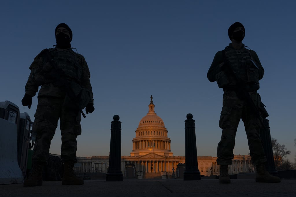National Guard soldiers at their posts outside the Capitol. File photo: AP National Guard soldiers at their posts outside the Capitol. File photo: AP