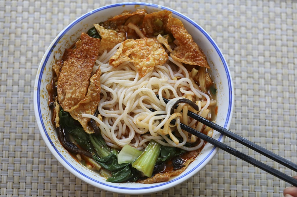 A bowl of Luosifen, snail noodles, a rice noodle with snail soup, is pictured at the restaurant, Eighty-Eight Noodles, in Beijing, China. Photo: Simon Song A bowl of Luosifen, snail noodles, a rice noodle with snail soup, is pictured at the restaurant, Eighty-Eight Noodles, in Beijing, China. Photo: Simon Song
