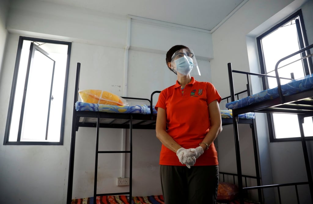 Singapore’s former Minister of Manpower Josephine Teo tours a dormitory room for migrant workers on May 15, 2020. Photo: Reuters