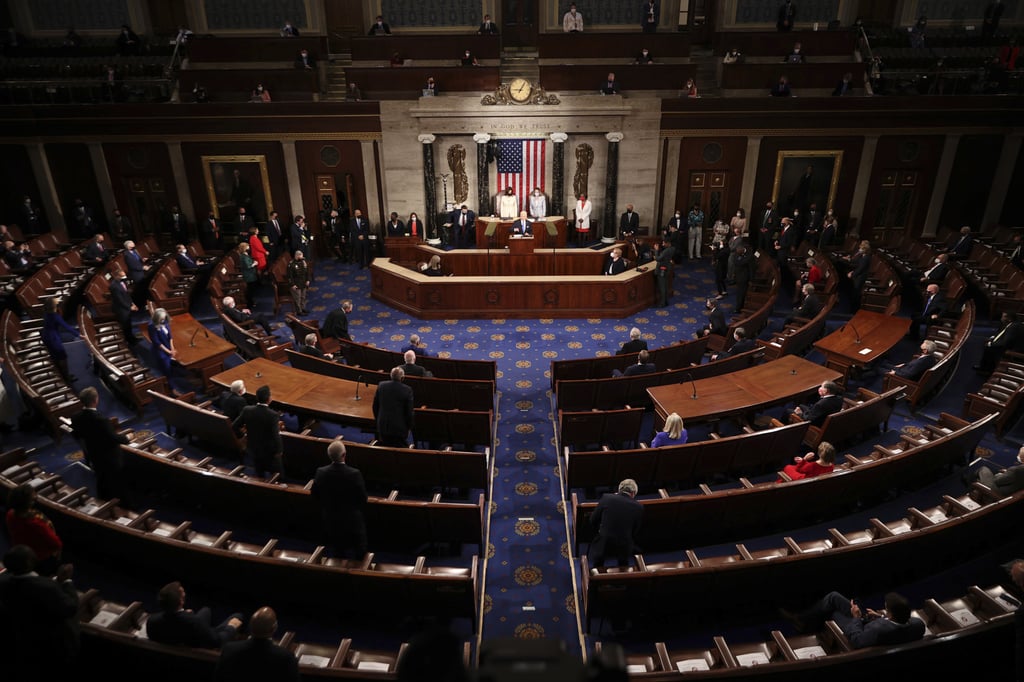 President Joe Biden’s address was in a mostly empty – and fully masked – chamber. Photo: AP