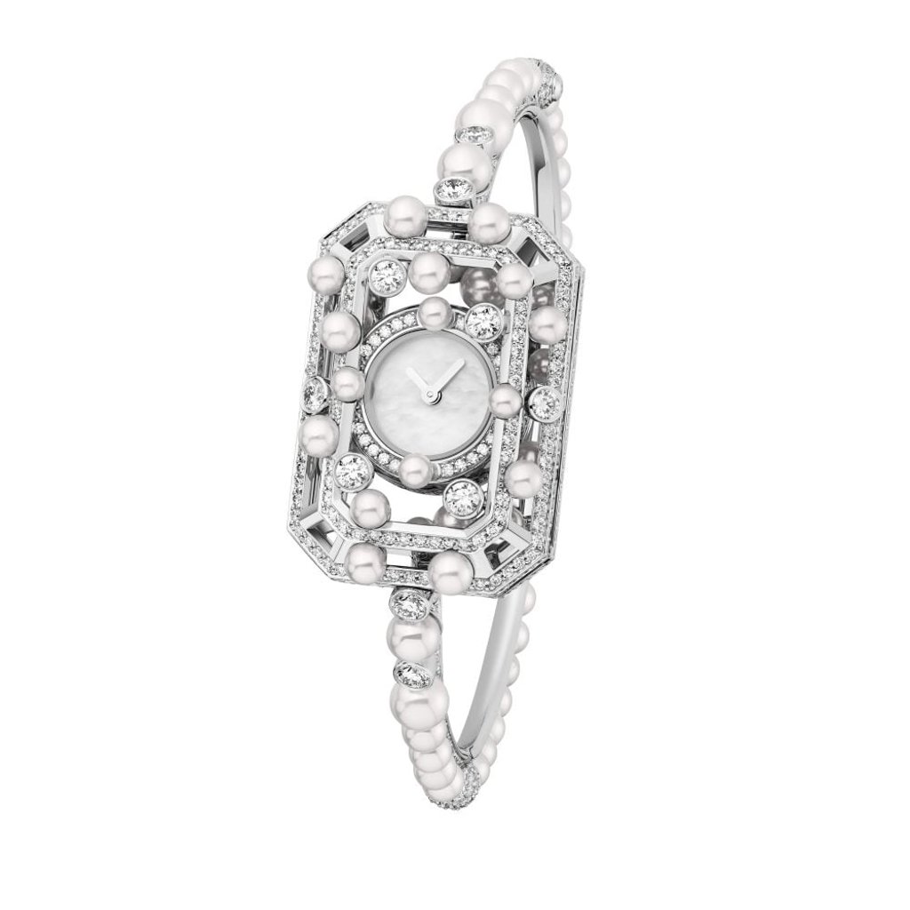 Chanel Bubbly Stopper jewellery watch in white gold, diamonds and cultured pearls. Photo: Chanel Chanel Bubbly Stopper jewellery watch in white gold, diamonds and cultured pearls. Photo: Chanel