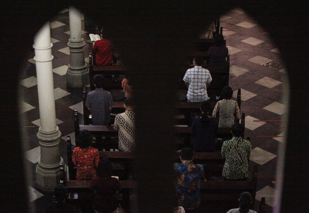 Christian devotees gather at a church in Bogor, West Java. Photo: Feature China/Barcroft Media via Getty Images Christian devotees gather at a church in Bogor, West Java. Photo: Feature China/Barcroft Media via Getty Images